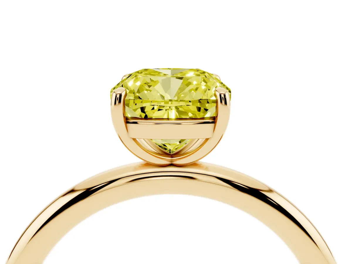 Fancy Yellow Cushion Cut Solitaire Diamond Ring with Four-Prong Setting on a Plain Band Yellow gold