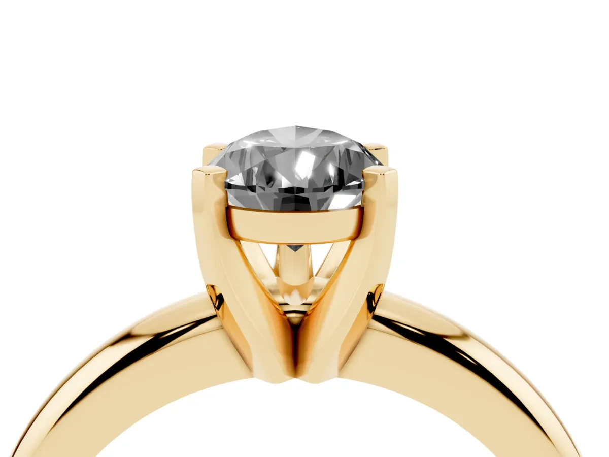 Fancy Black Pear Cut Diamond Solitaire Engagement Ring with Round Band and Four-Prong Setting Yellow gold