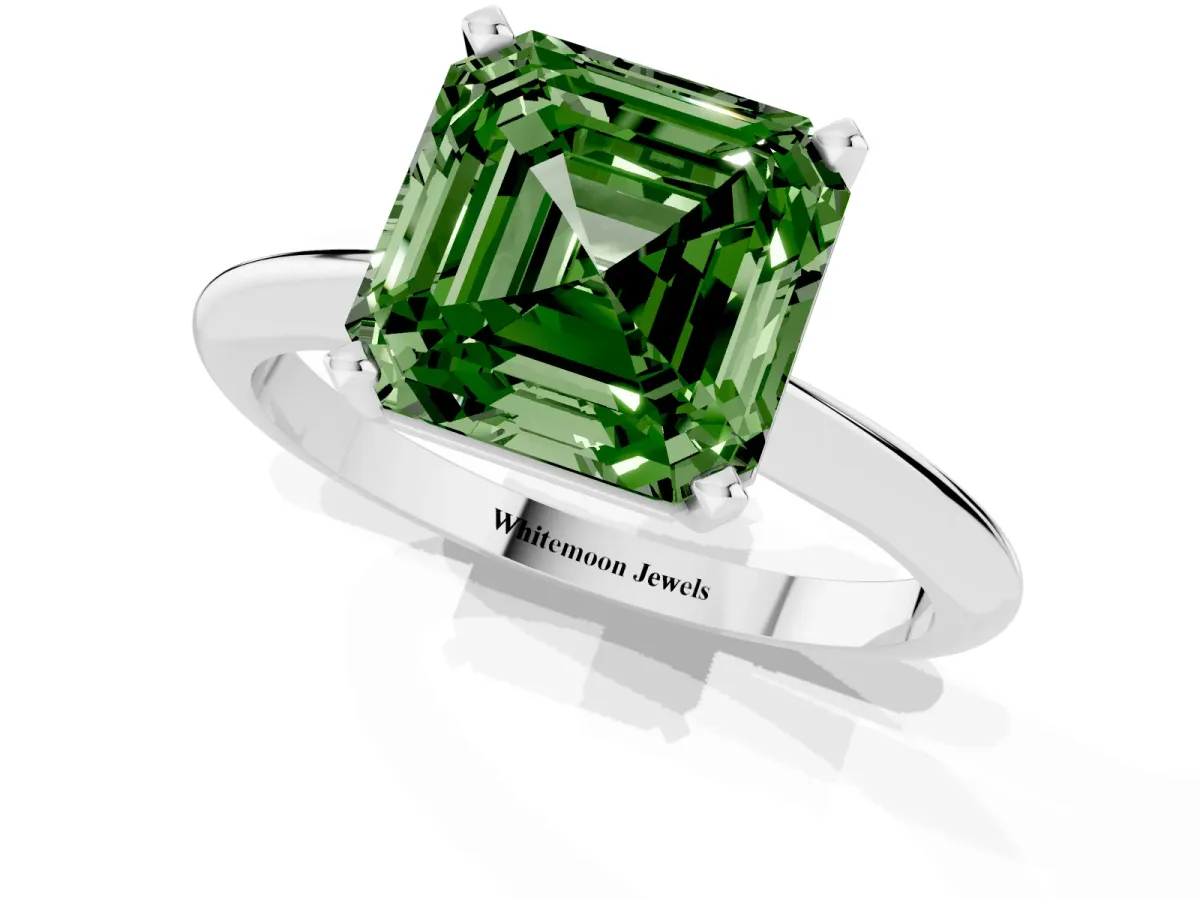 Fancy Green Asscher Cut Cut Solitaire Ring with Four-Prong Setting on a Classic Band Silver