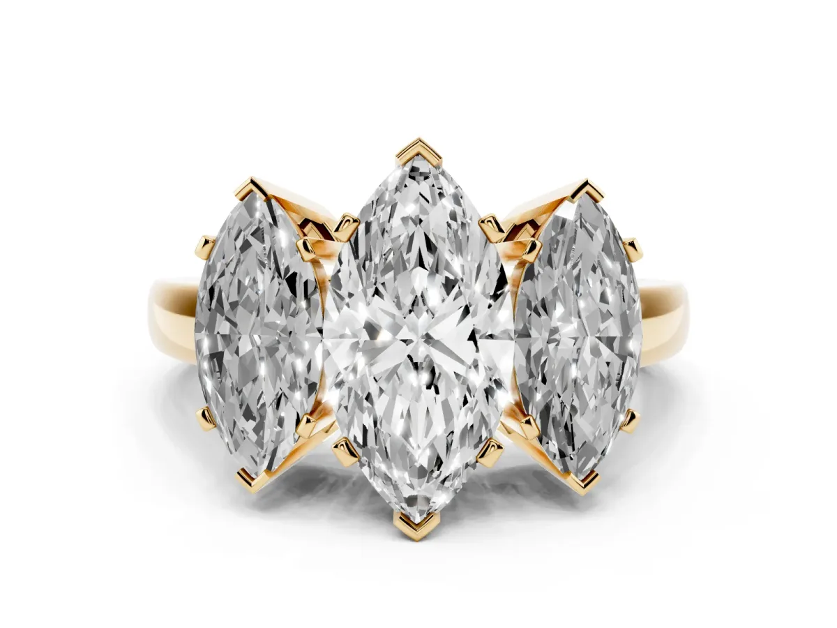 Three-Stone Marquise Cut Cut Diamond Ring with Channel Set Band and Four-Prong Setting Yellow gold