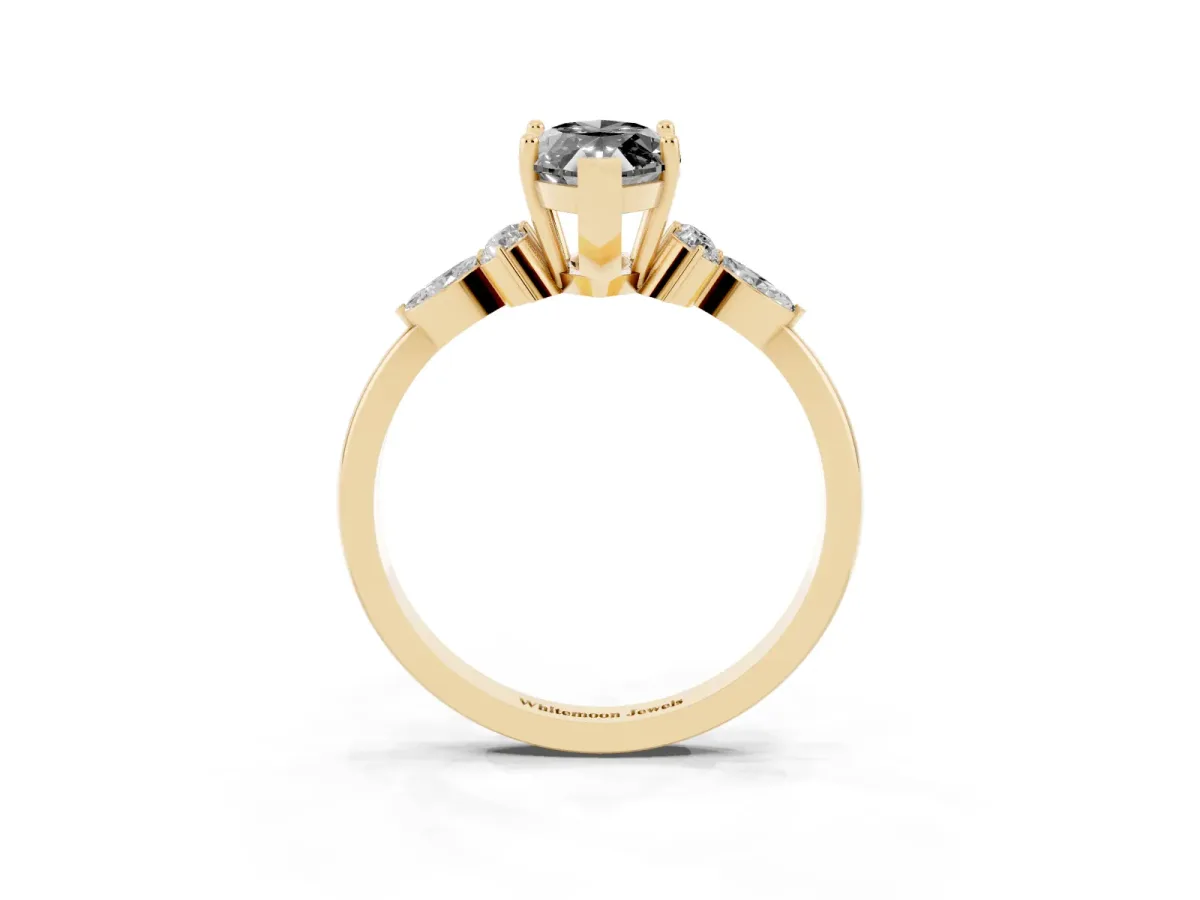 Fancy Black Marquise Cut Brilliant Diamond Solitaire Ring with Pear Side Stones and Four-Prong Setting Yellow gold