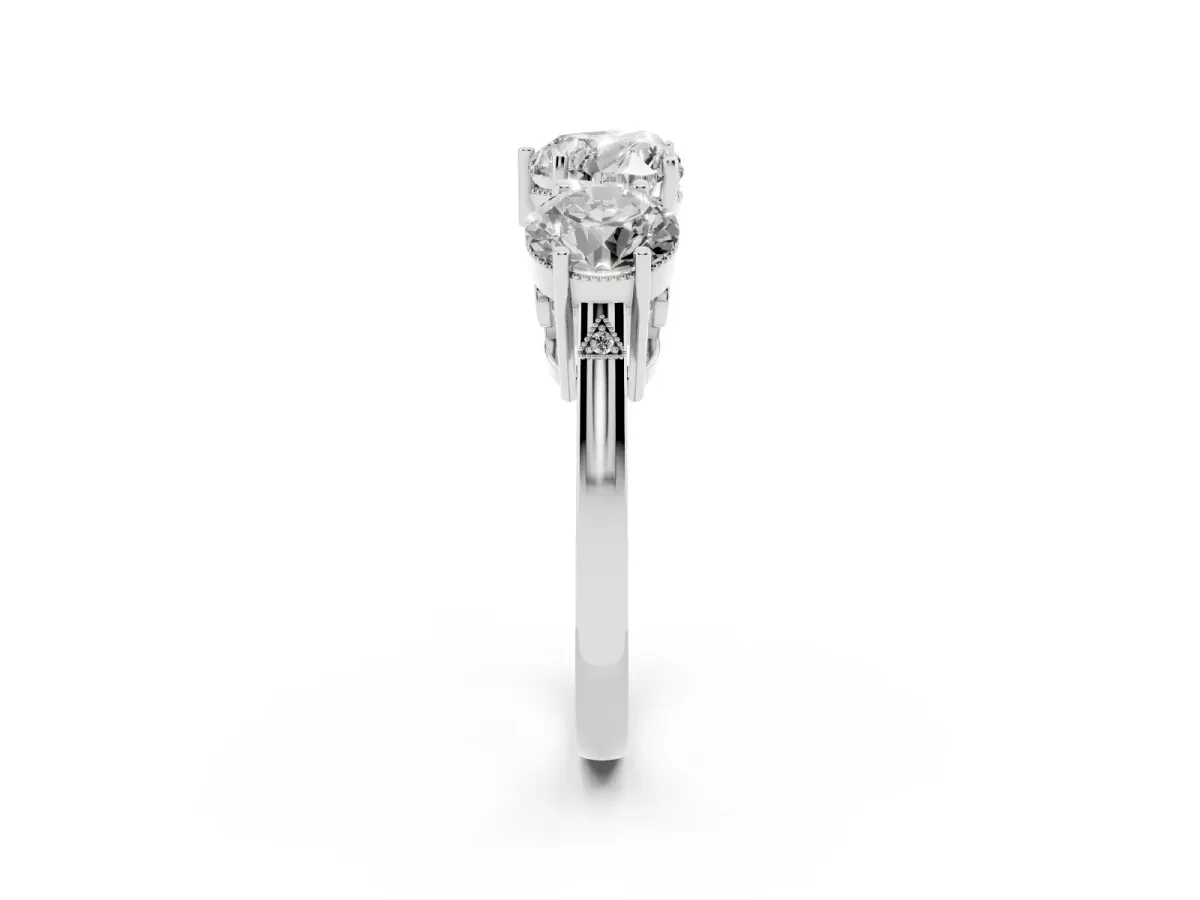 Three-Stone Heart Cut Diamond Engagement Ring with Prong Setting on a Classic Band Silver