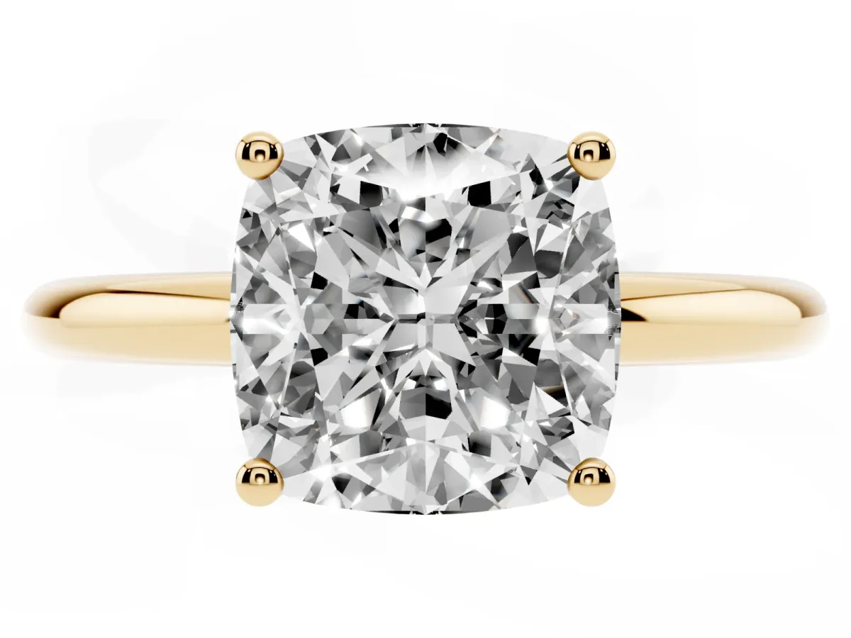 Cushion Cut Cut Solitaire Engagement Ring with Four-Prong Setting and Classic Band Yellow gold