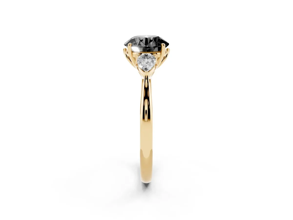 Fancy Black Three-Stone Round Cut Brilliant Diamond Solitaire Ring with Tapered Band and Four-Prong Setting Yellow gold