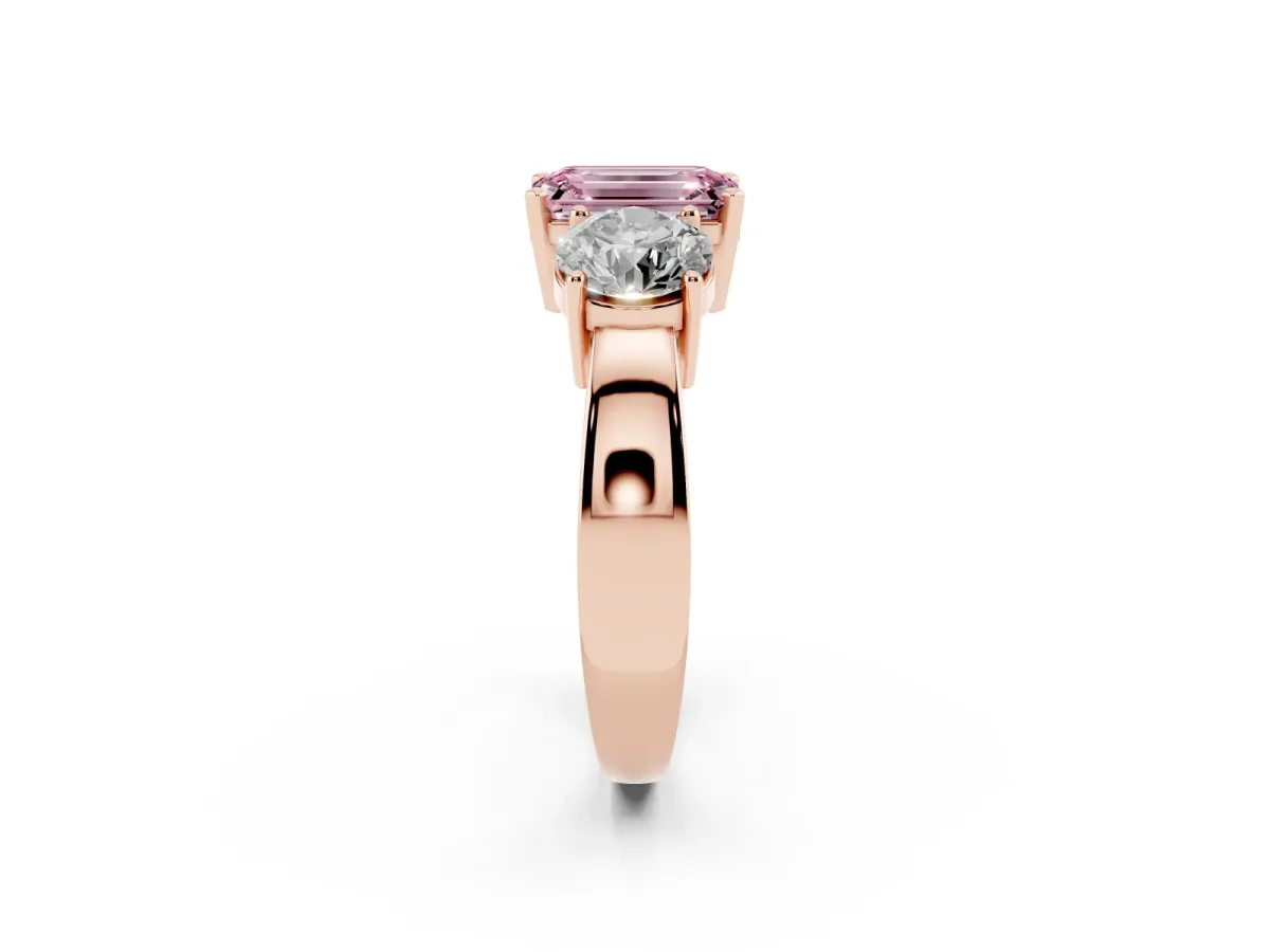Fancy Pink Three-Stone Emerald Cut Diamond Ring with Round Side Stones, Classic Band, and Four-Prong Setting Rose gold