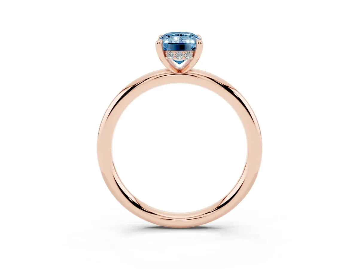 Fancy Blue Emerald Cut Diamond Solitaire Ring with Thin Band and Four-Prong Setting Rose gold