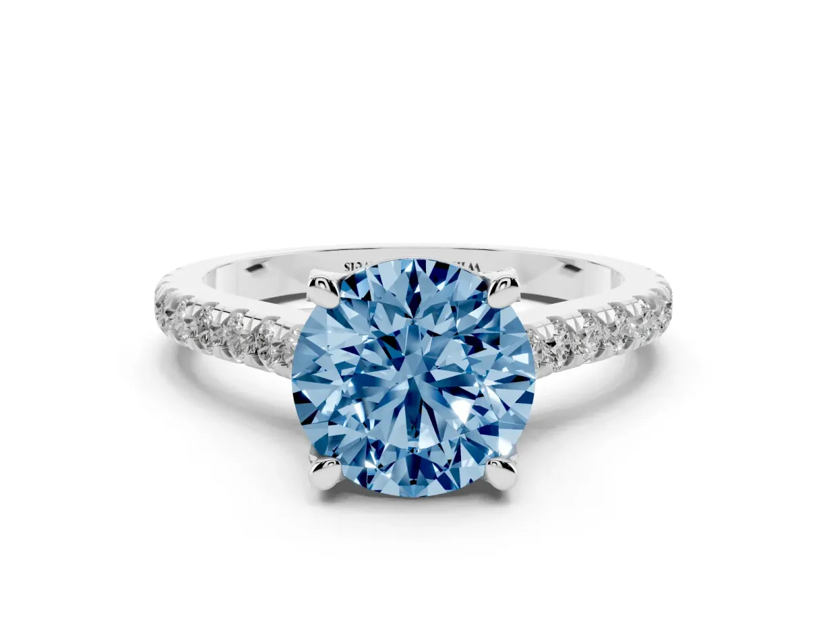 Fancy Blue Round Cut Brilliant Diamond Solitaire with Pavé Band and Four-Prong Setting Platinum
