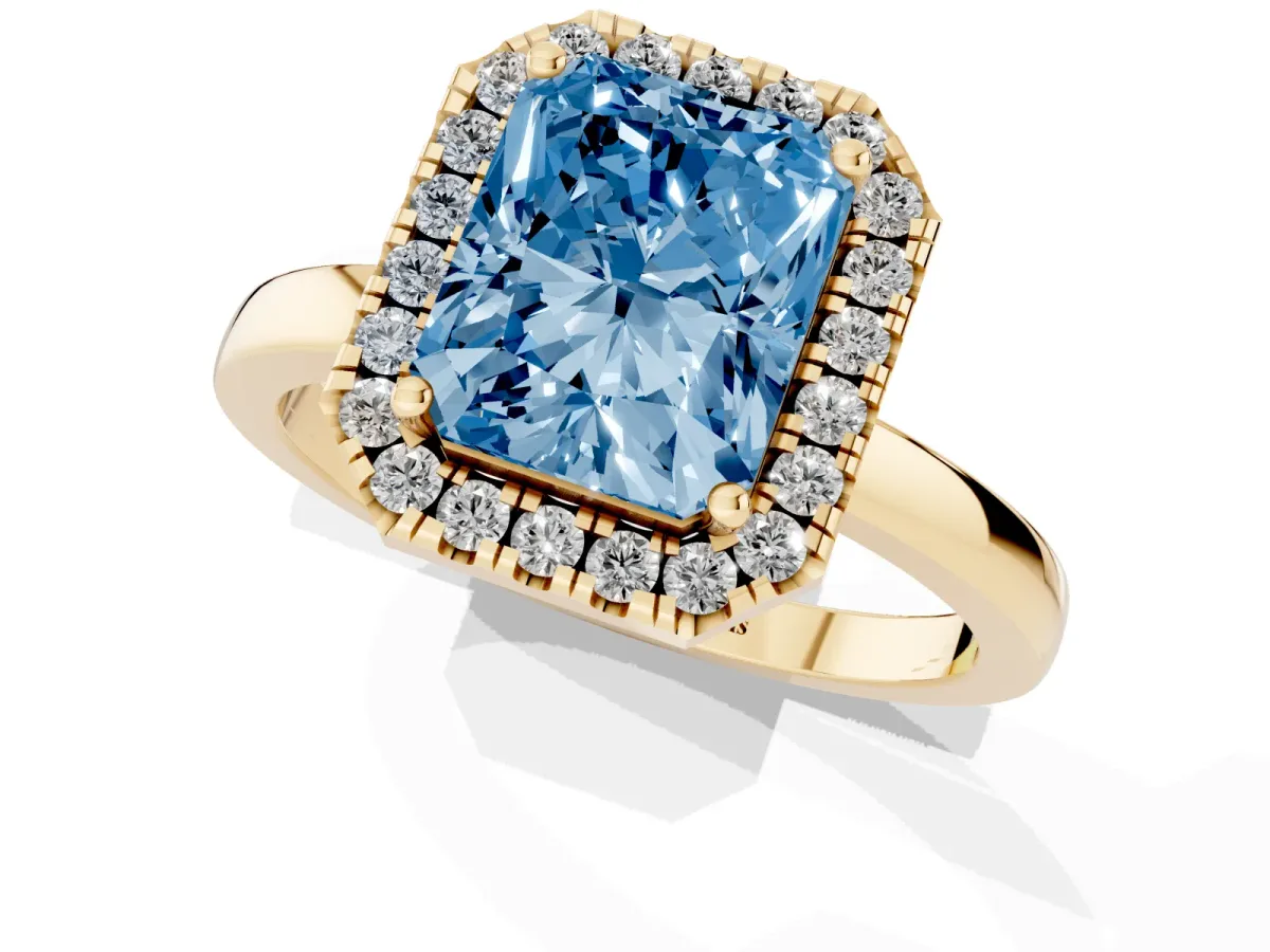 Fancy Blue Radiant Cut Halo Diamond Solitaire with Pavé Band and Four-Prong Setting Yellow gold