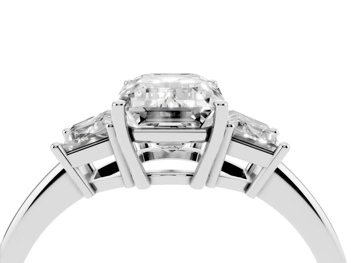 Emerald Cut Diamond Three-Stone Ring with Trapezoid Side Stones and Prong Setting Silver