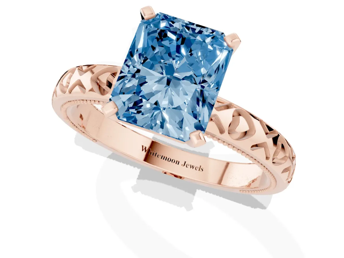Fancy Blue Radiant Cut Solitaire Diamond Engagement Ring with XO Engraved Band and Four-Prong Setting Rose gold