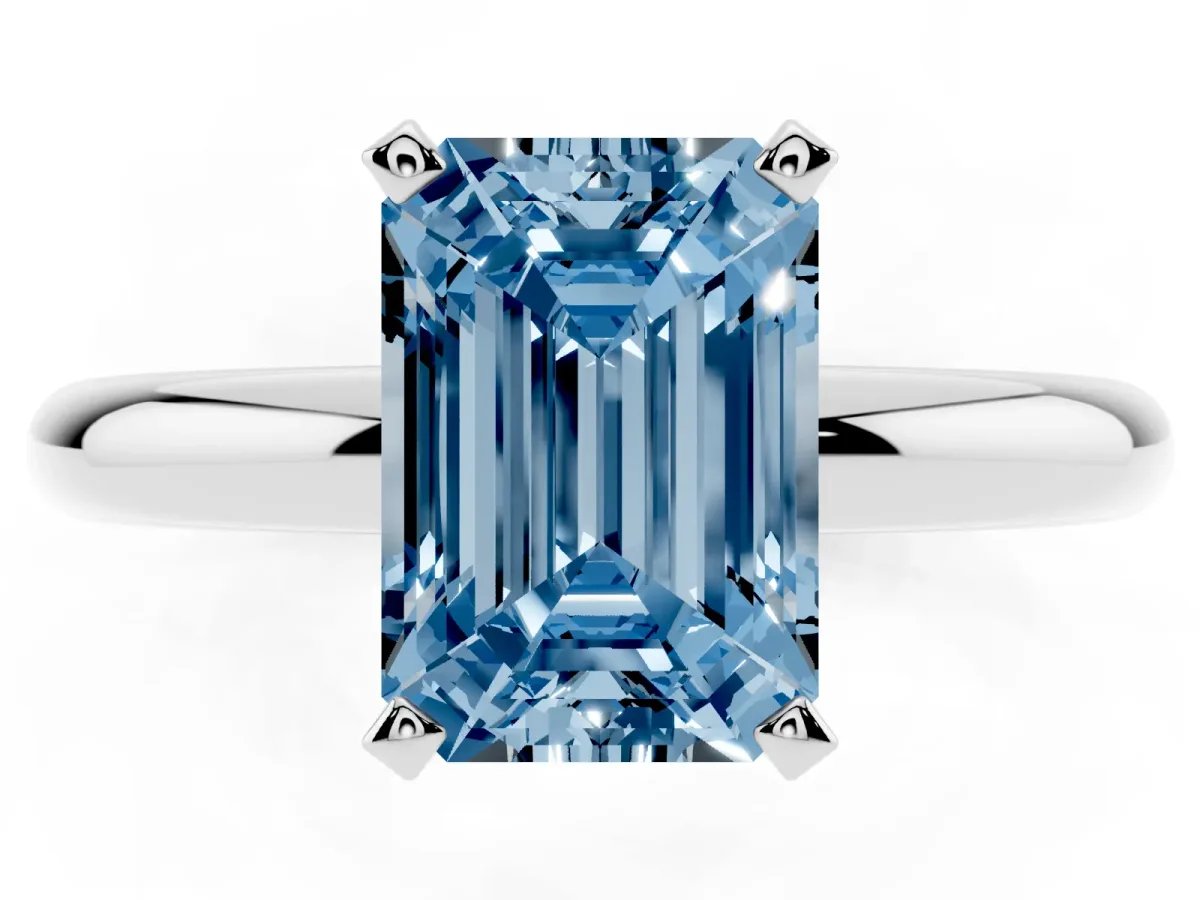 Fancy Blue Emerald Cut Diamond Solitaire Engagement Ring with Round Band and Four-Prong Setting Silver