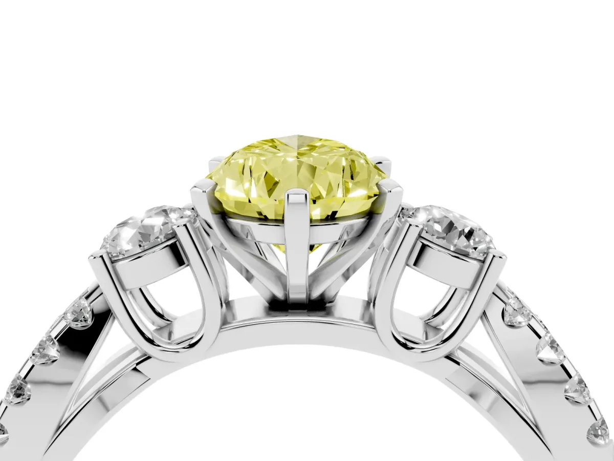 Fancy Yellow Pear Cut Diamond Three-Stone Ring with Pavé Split Shank and Four-Prong Setting Silver