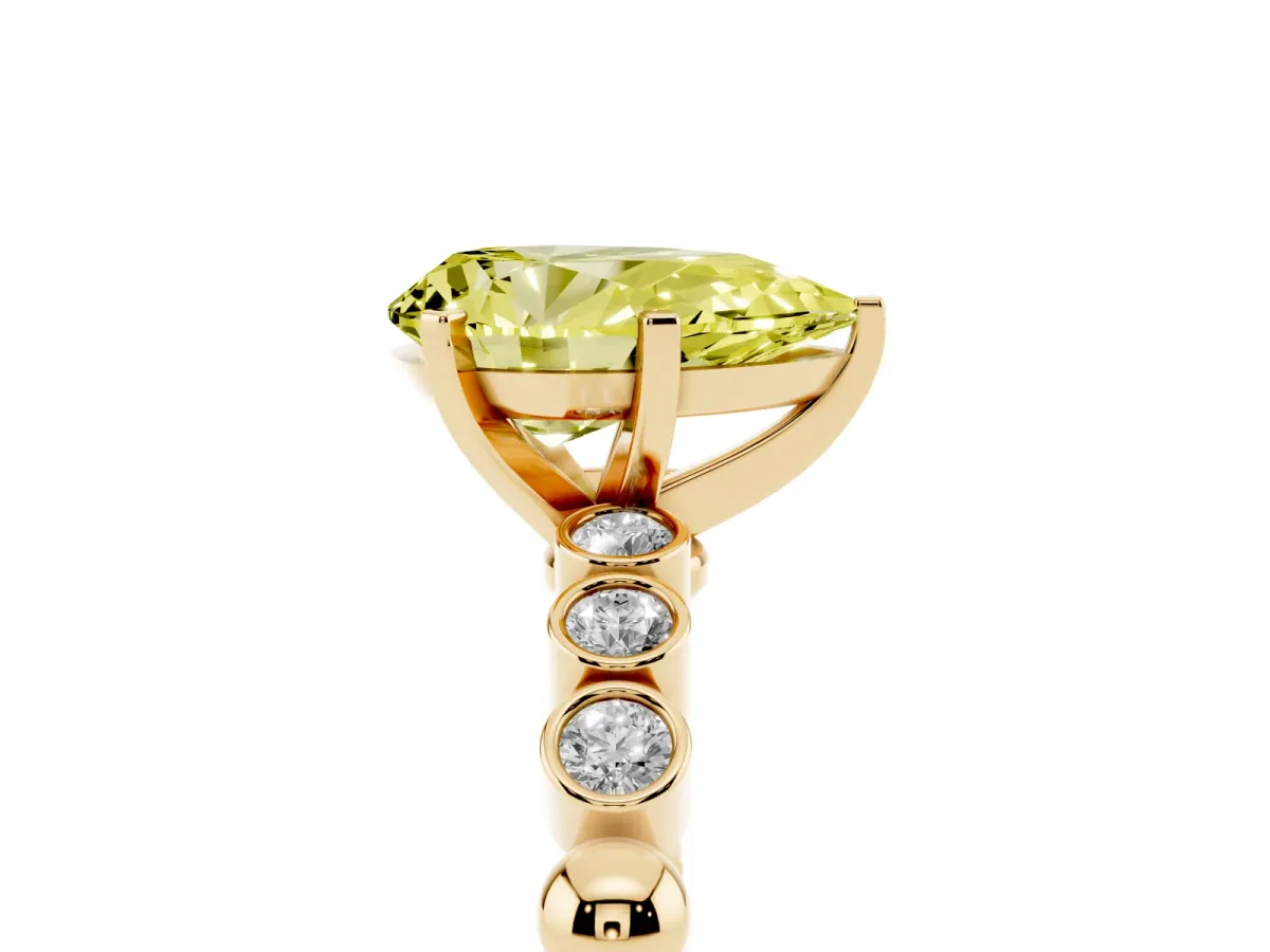 Fancy Yellow Pear Cut Solitaire Bezel Accent Diamond Engagement Ring with Beaded Band and Four-Prong Setting Yellow gold