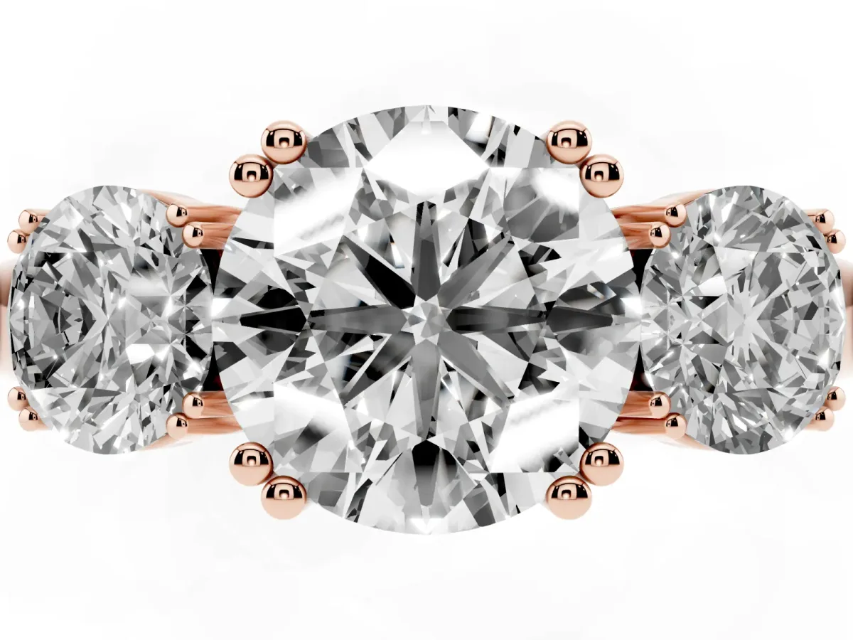 Three-Stone Round Cut Cut Diamond Ring with Channel Set Band and Four-Prong Setting Rose gold