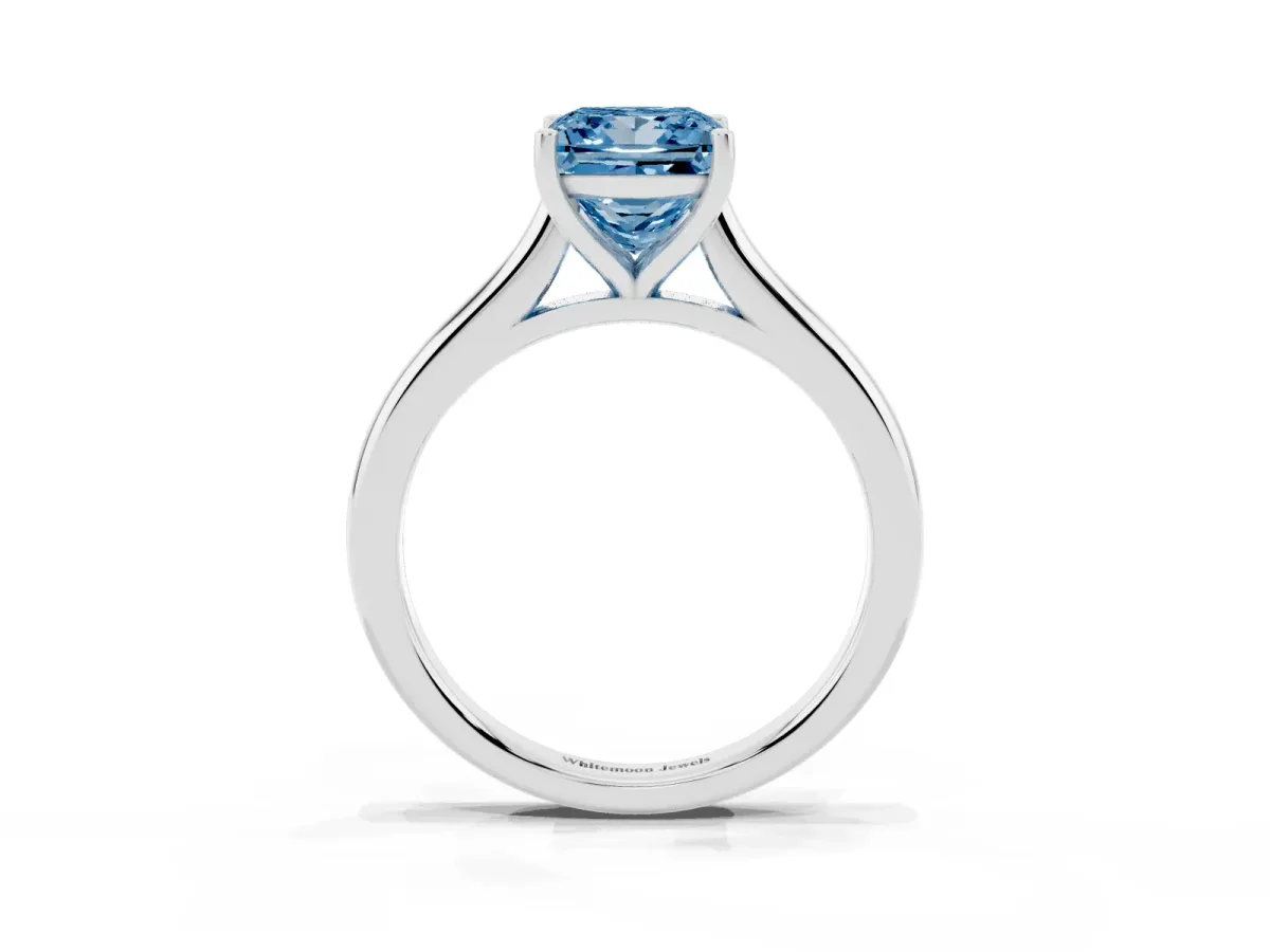 Fancy Blue Princess Cut Cut Solitaire Ring with Cathedral Band and Four-Prong Setting Silver