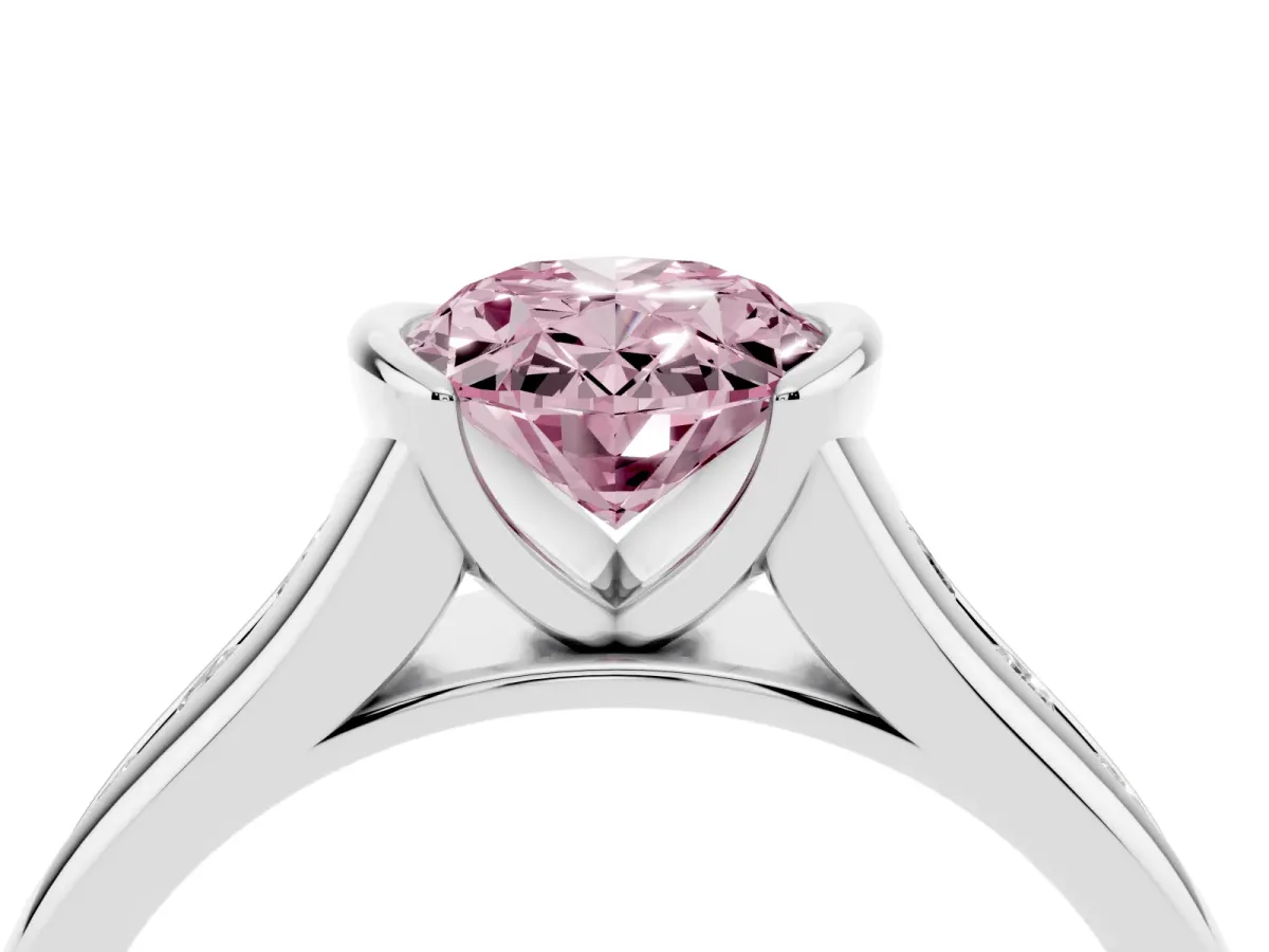 Fancy Pink Oval Cut Solitaire Bezel-Set Diamond Ring with Channel-Set Band Silver
