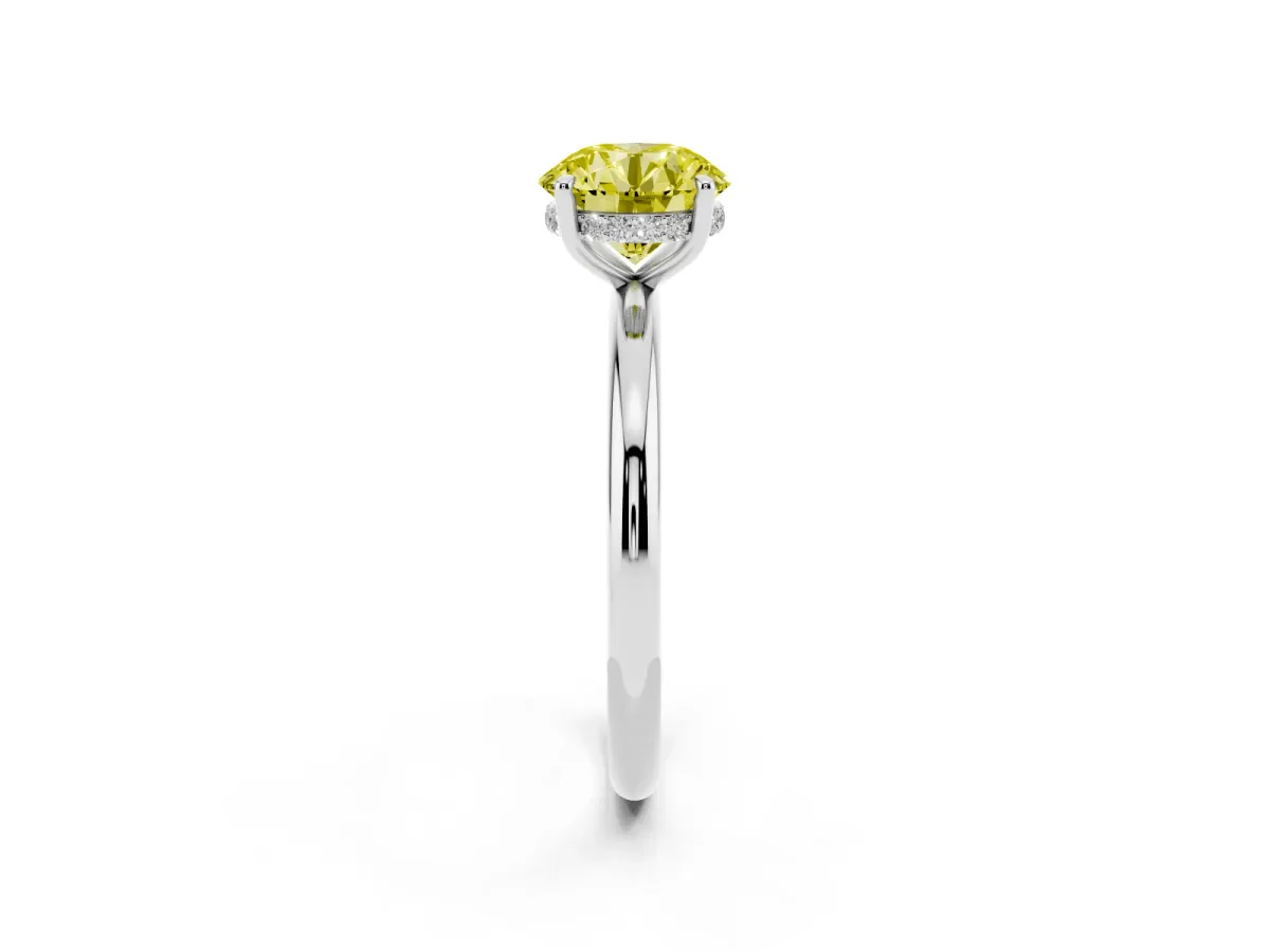Fancy Yellow Round Cut Diamond Solitaire Ring with Thin Band and Four-Prong Setting Platinum