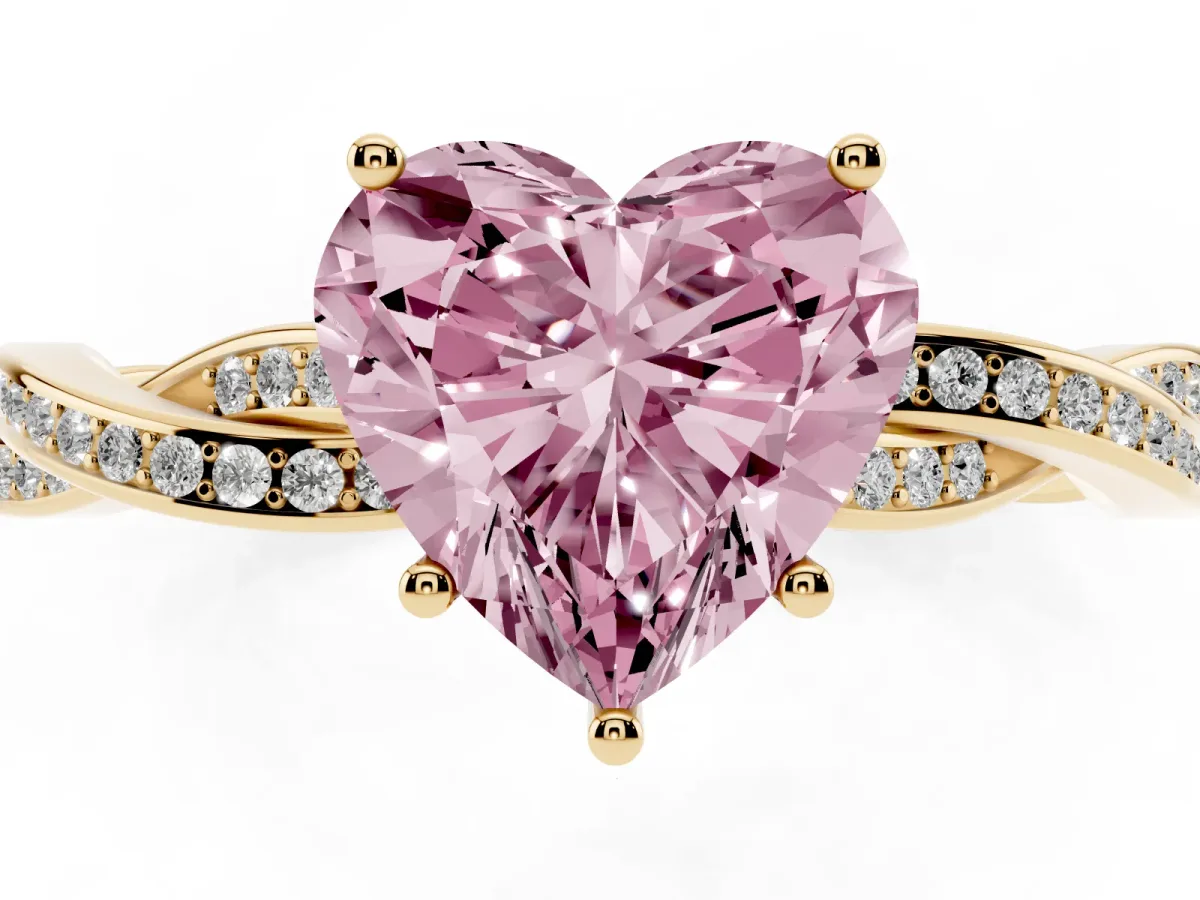 Fancy Pink Heart Cut Solitaire Twisted Pave Diamond Ring with Four-Prong Setting Yellow gold