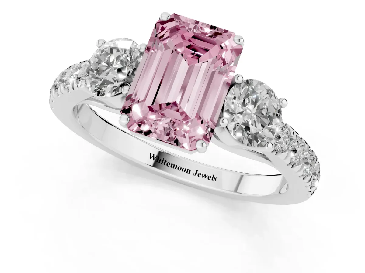 Fancy Pink Emerald Cut Cut Diamond Three-Stone Ring with Round Side Stones and Pavé Band Silver