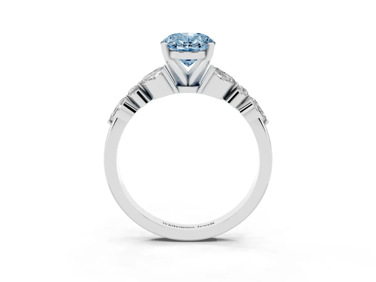 Fancy Blue Oval Cut Diamond Solitaire Ring with Side Stones and Four-Prong Setting Silver