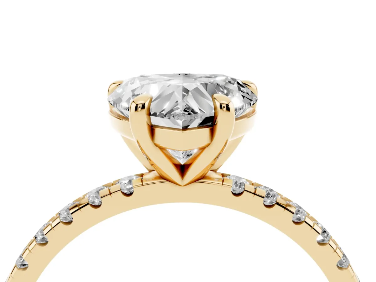 Heart Cut Diamond Brilliant Solitaire Ring with Pavé Band and Four-Prong Setting Yellow gold