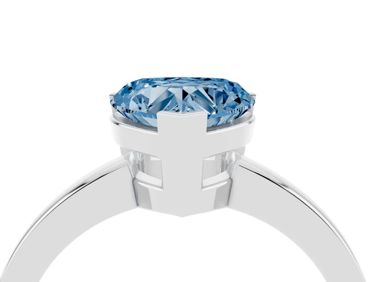 Fancy Blue Heart Cut Cut Solitaire Ring with Four-Prong Setting and Classic Band Silver