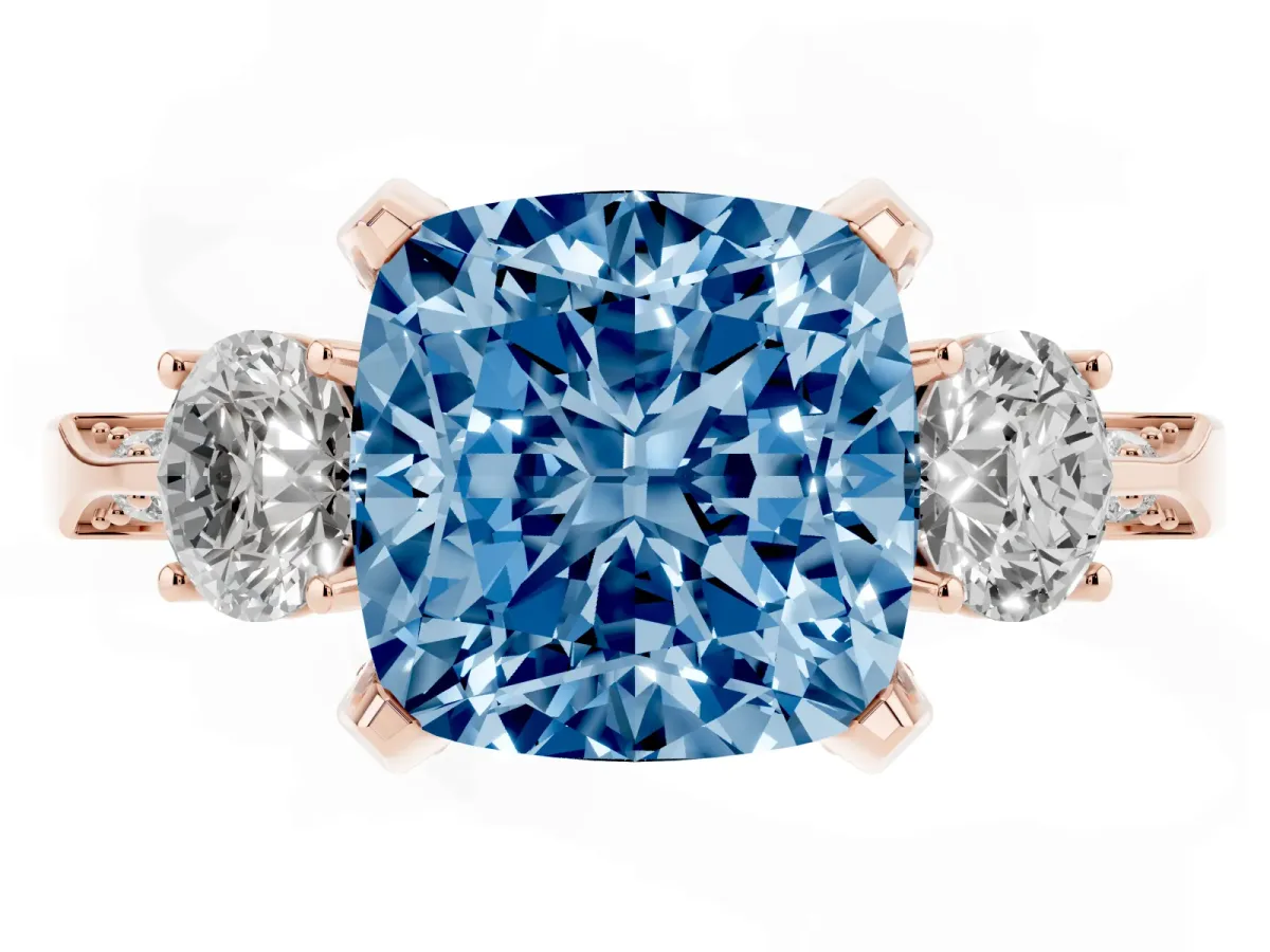 Fancy Blue Cushion Cut Brilliant Three-Stone Diamond Ring with Pavé Band and Four-Prong Setting Rose gold