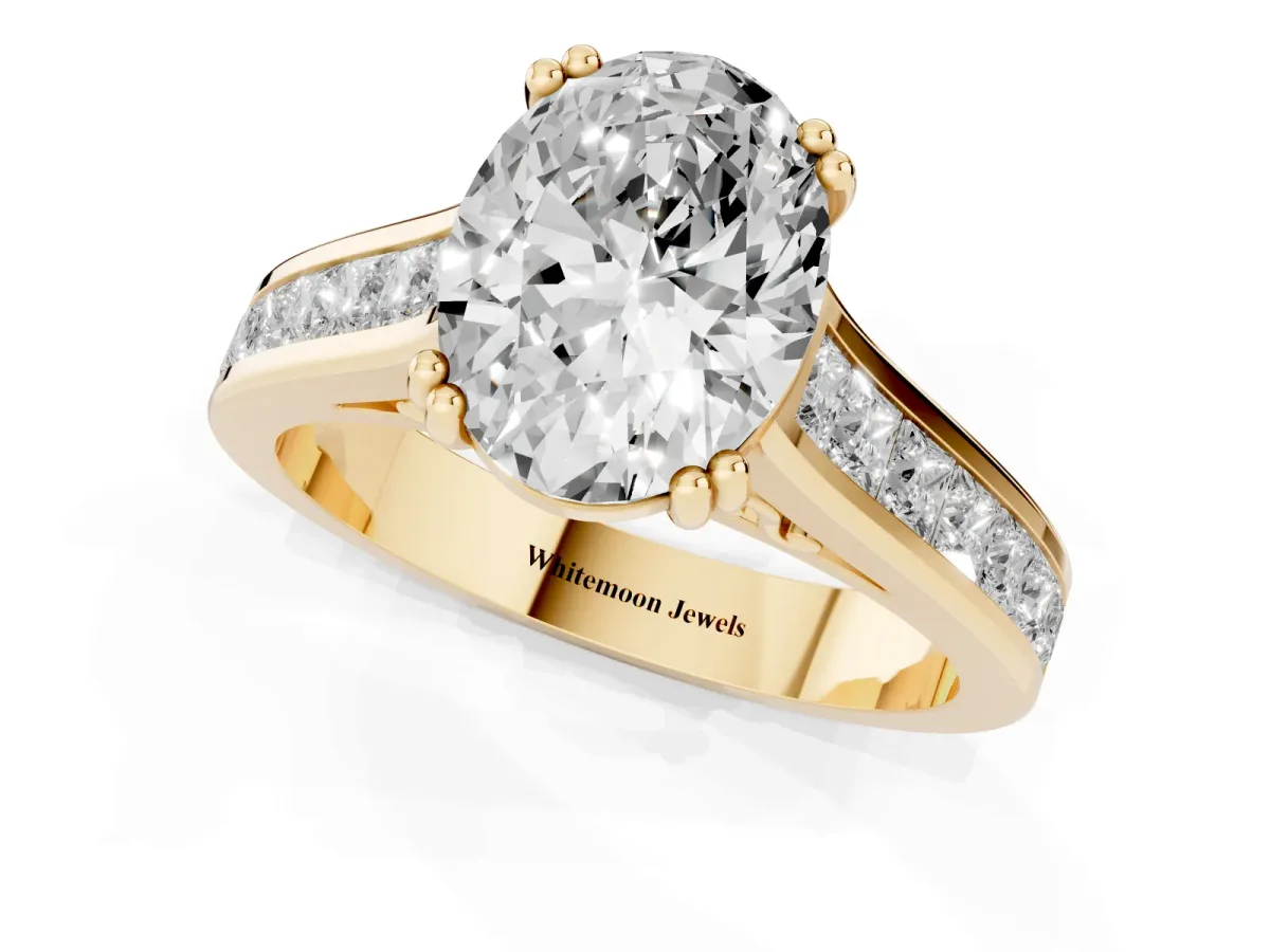 Oval Cut Cut Channel Set Solitaire Engagement Ring with Prong Setting Yellow gold