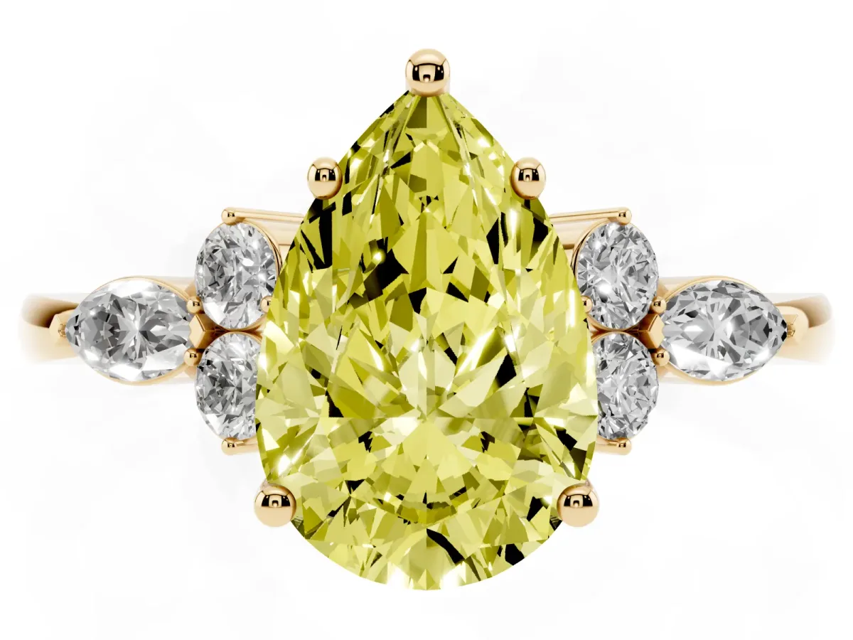 Fancy Yellow Pear Cut Brilliant Diamond Solitaire Ring with Pear Side Stones and Four-Prong Setting Yellow gold