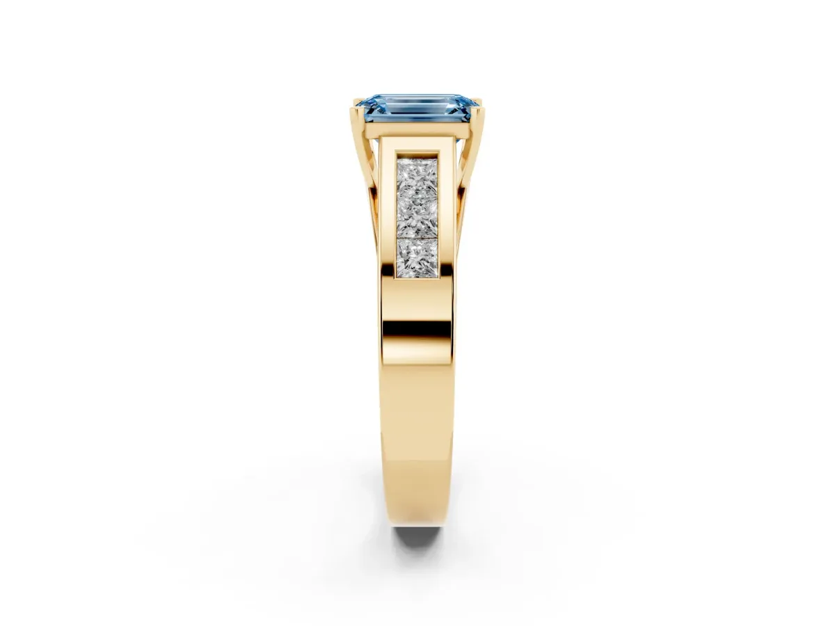 Fancy Blue Emerald Cut Cut Channel Set Solitaire Ring with Four-Prong Setting Yellow gold