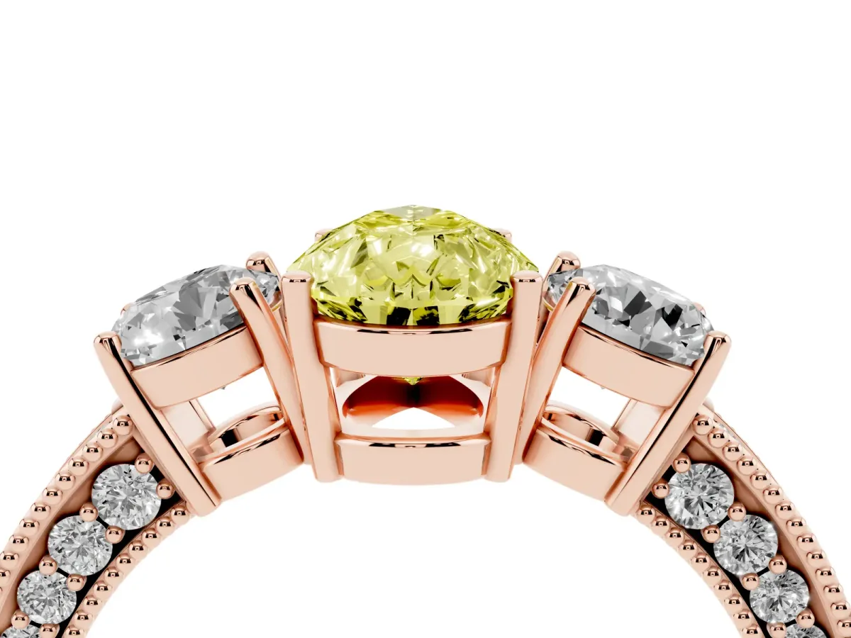 Fancy Yellow Pear Cut Three-Stone Diamond Ring with Pavé Band and Four-Prong Setting Rose gold