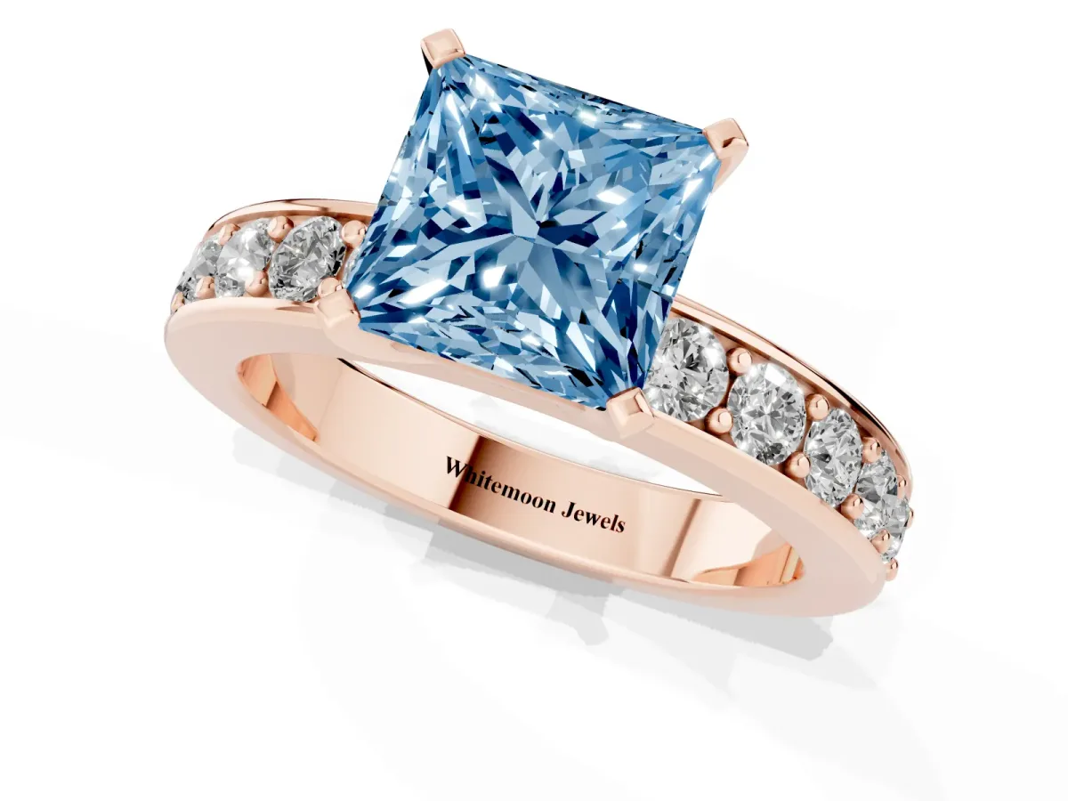 Fancy Blue Princess Cut Diamond Engagement Ring with Channel Set Round Band and Prong Setting Rose gold