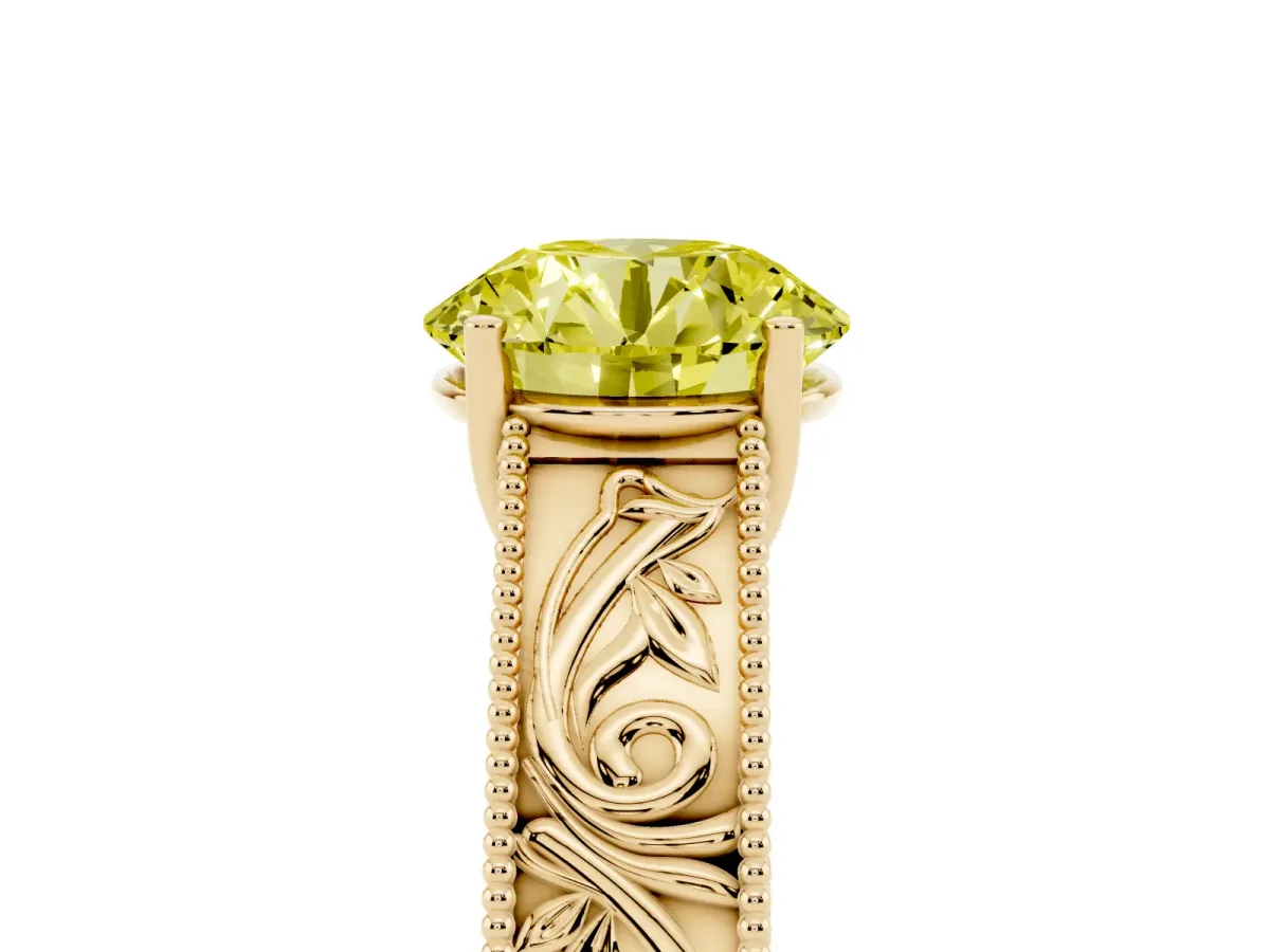 Fancy Yellow Round Cut Diamond Solitaire Ring with Engraved Band and Four-Prong Setting Yellow gold