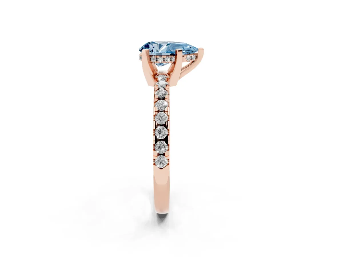 Fancy Blue Pear Cut Diamond Solitaire Ring with Round Pavé Band and Four-Prong Setting Rose gold