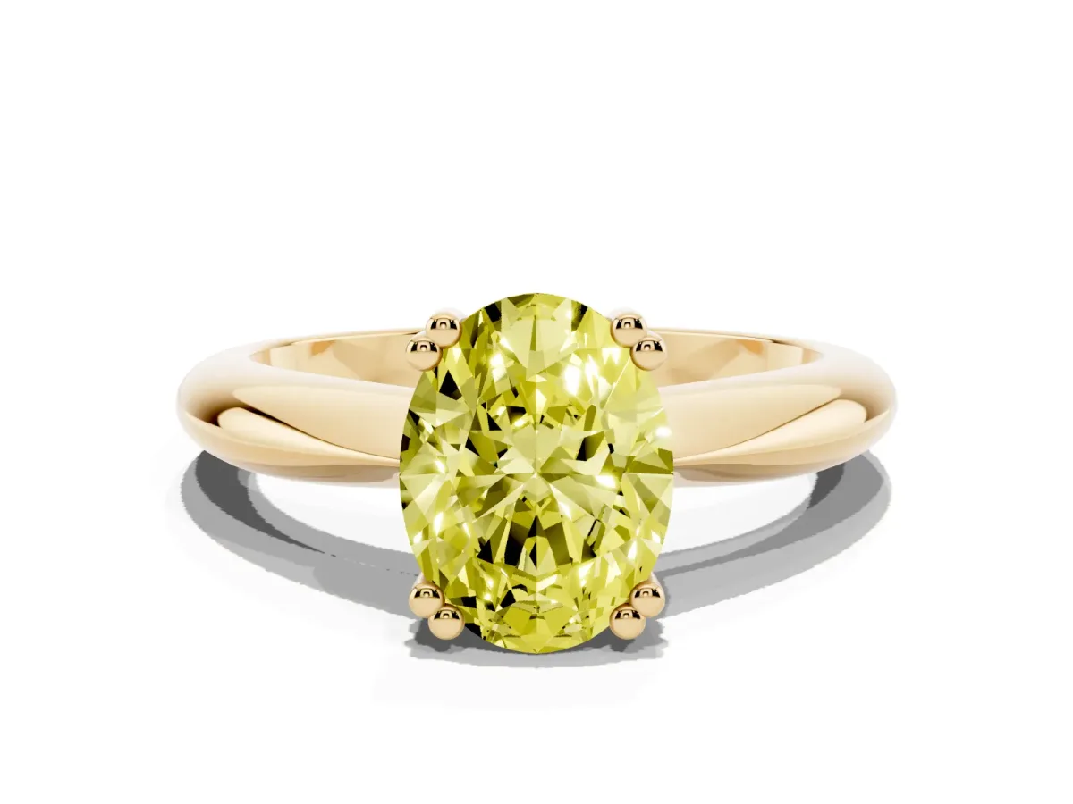 Fancy Yellow Oval Cut Cut Solitaire Engagement Ring with Tapered Band and Four-Prong Setting Yellow gold