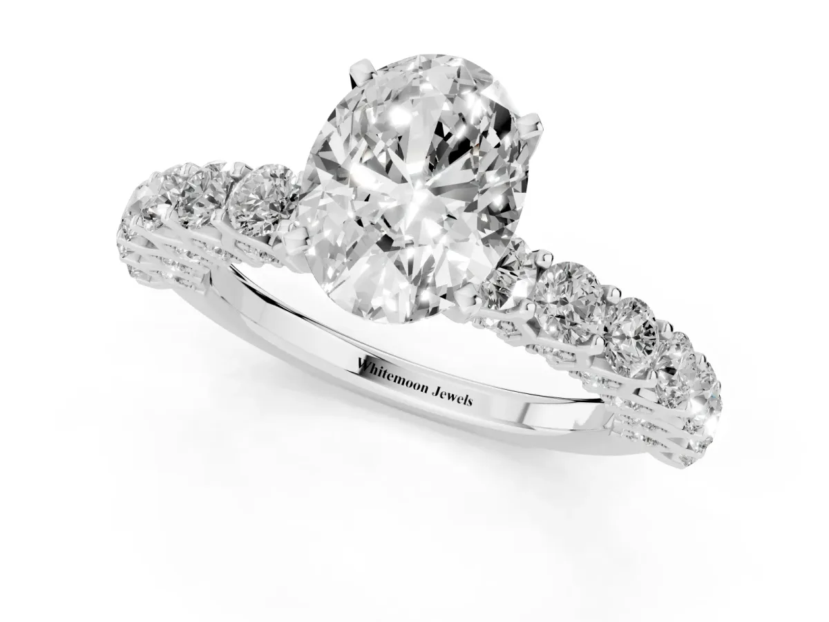 Oval Cut Diamond Solitaire Ring with Shared Prong Pavé Band and Four-Prong Setting Silver