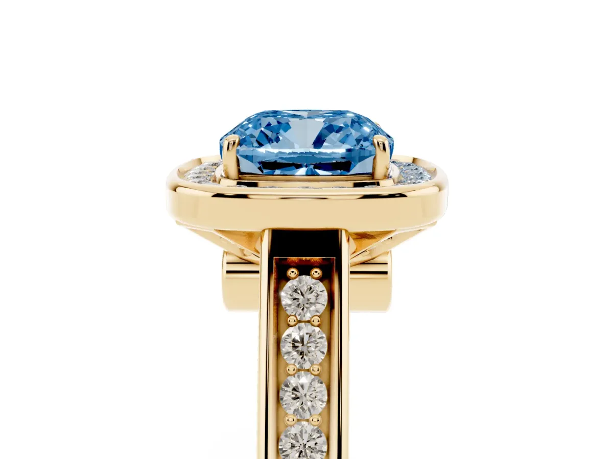 Fancy Blue Cushion Cut Halo Solitaire Diamond Ring with Pave Band and Bezel Setting Yellow gold