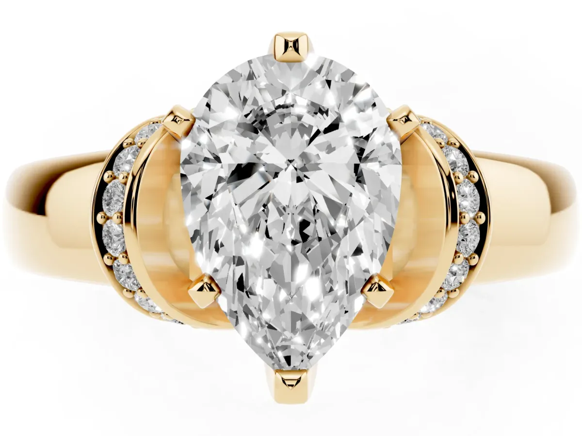 Pear Cut Solitaire Diamond Ring with Pave Band and Six-Prong Setting Yellow gold