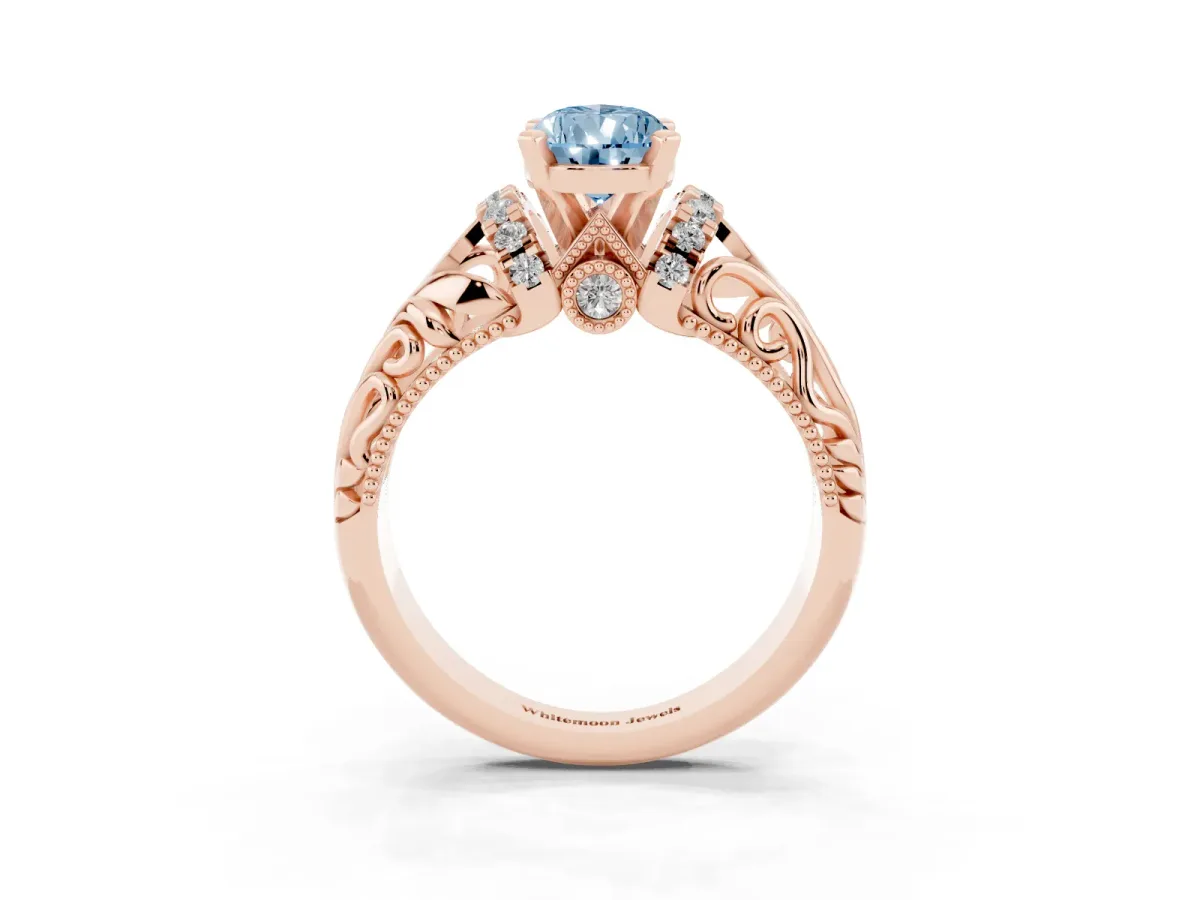 Fancy Blue Pear Cut Solitaire Filigree Engagement Ring with Halo and Prong Setting Rose gold