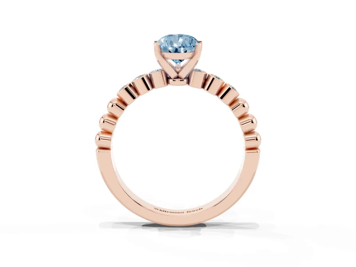 Fancy Blue Pear Cut Solitaire Bezel Accent Diamond Engagement Ring with Beaded Band and Four-Prong Setting Rose gold