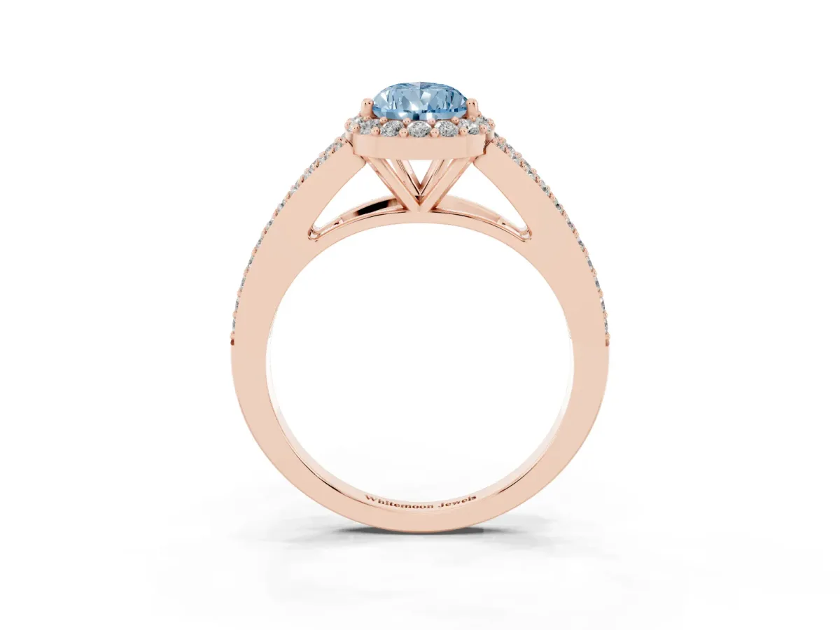 Fancy Blue Pear Cut Halo Split Shank Diamond Ring with Prong Setting Rose gold