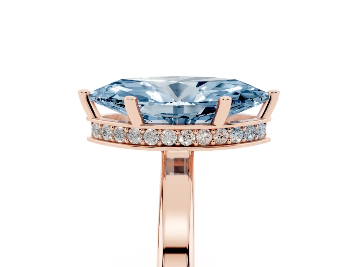 Fancy Blue Marquise Cut Cut Solitaire Engagement Ring with Four-Prong Setting on a Classic Band Rose gold