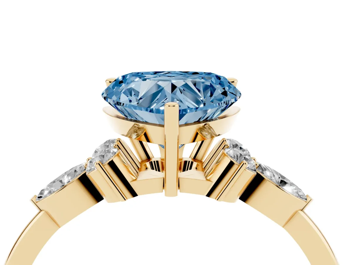 Fancy Blue Heart Cut Brilliant Diamond Solitaire Ring with Pear Side Stones and Four-Prong Setting Yellow gold