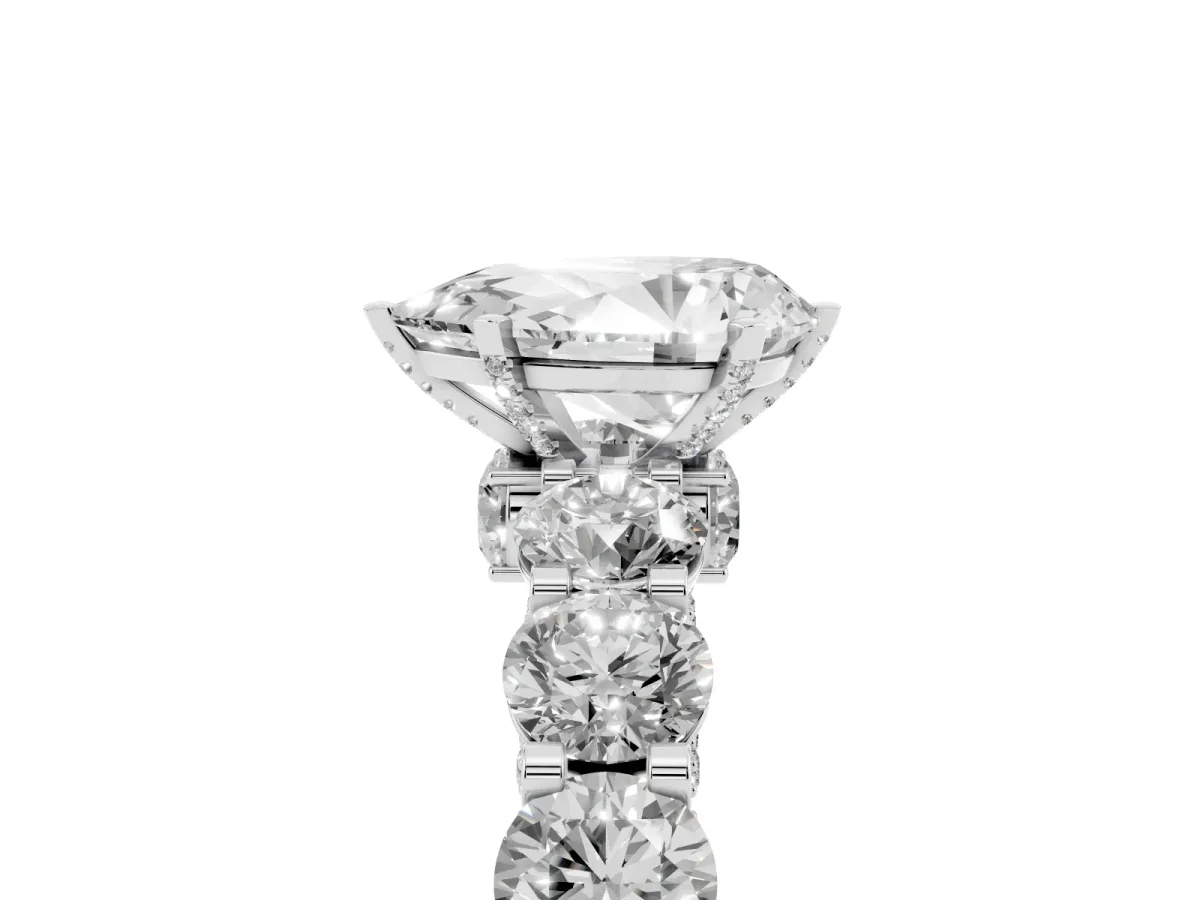 Pear Cut Diamond Side Stone Engagement Ring with Four-Prong Setting Silver