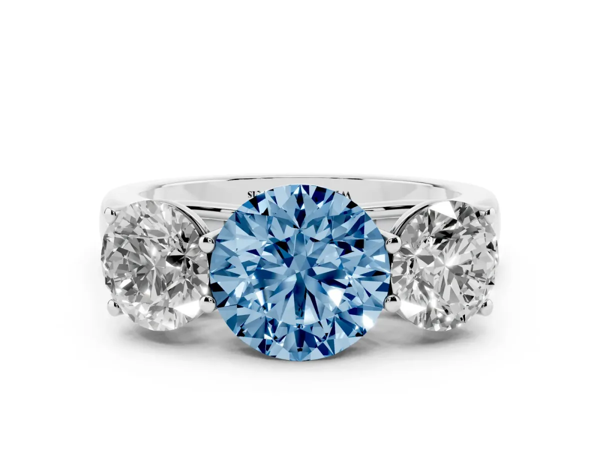 Fancy Blue Round Cut Three-Stone Diamond Ring with Prong Setting on a Classic Band Silver