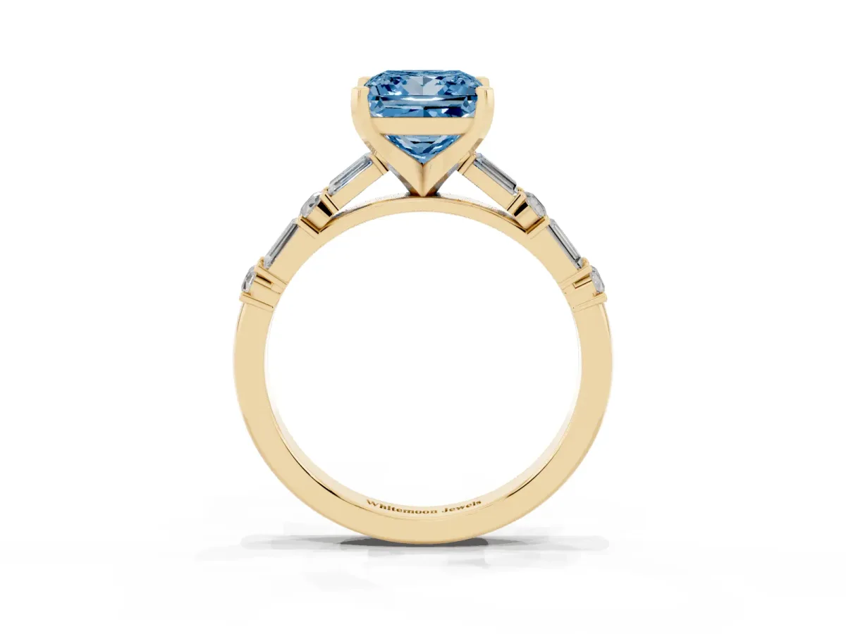 Fancy Blue Princess Cut Diamond Solitaire with Side Baguettes and Channel Set Band Yellow gold