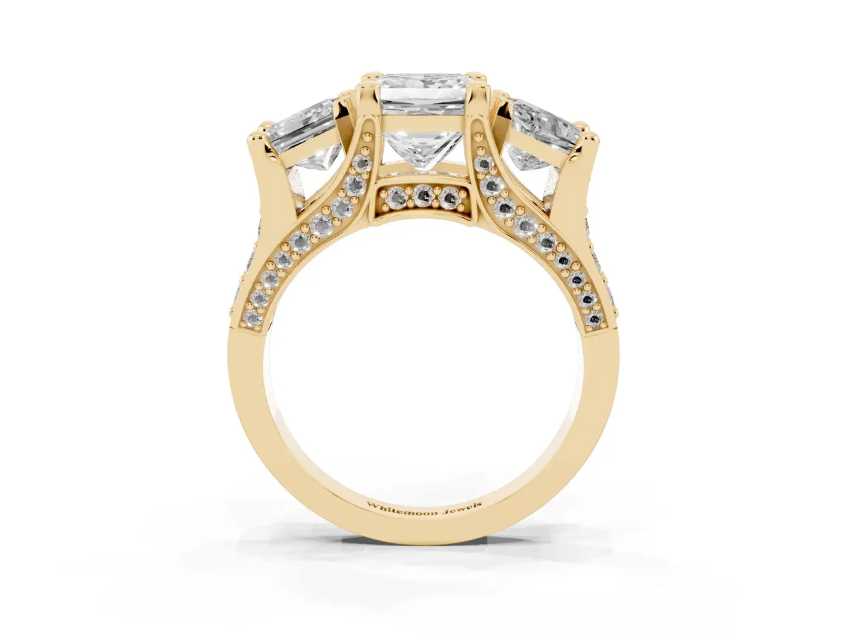 Princess Cut Diamond Three-Stone Ring with Channel Set Band and Four-Prong Setting Yellow gold