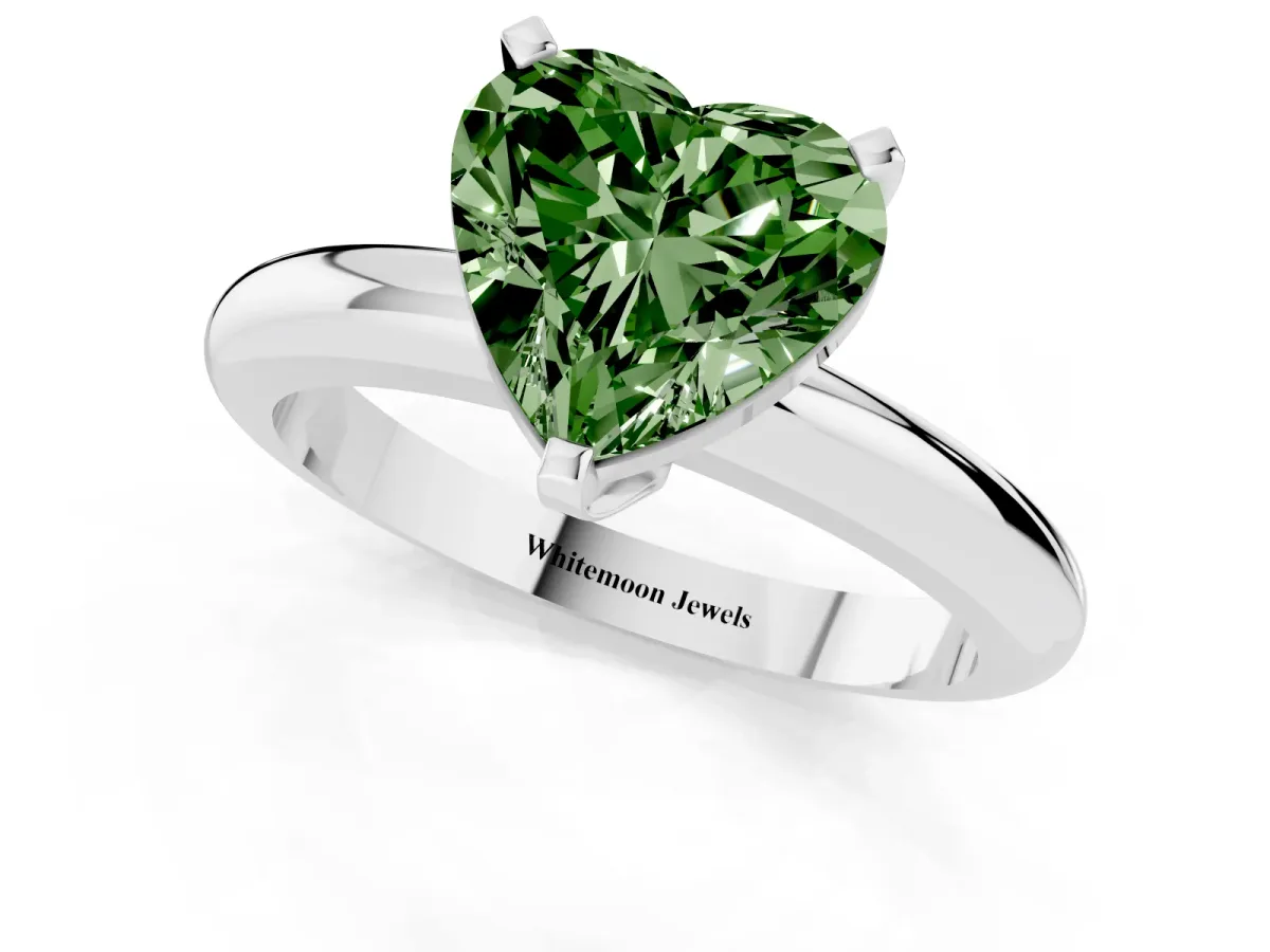 Fancy Green Heart Cut Diamond Solitaire Engagement Ring with Round Band and Four-Prong Setting Silver