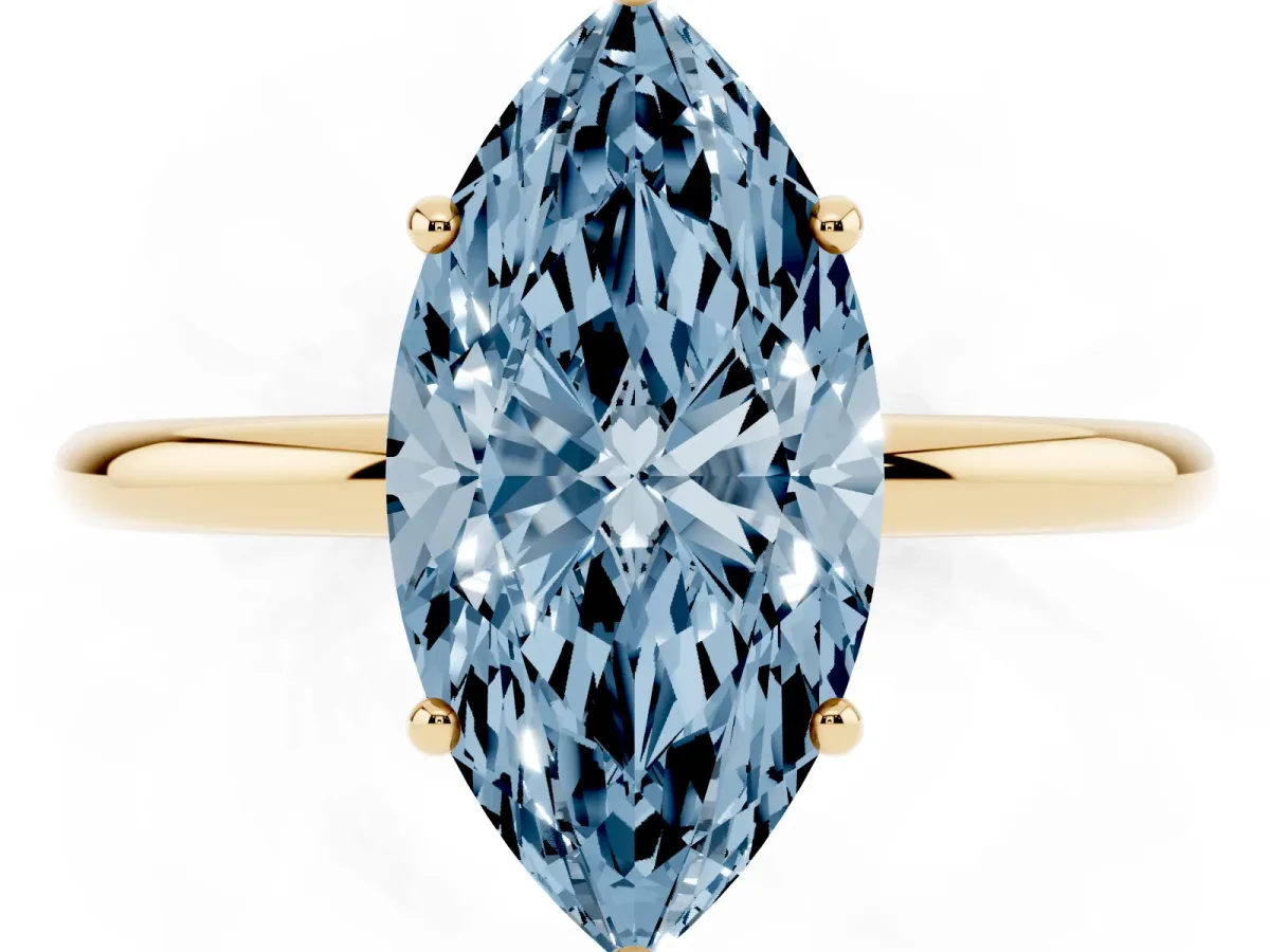 Fancy Blue Marquise Cut Solitaire Diamond Ring with a Classic Band and Four-Prong Setting Yellow gold