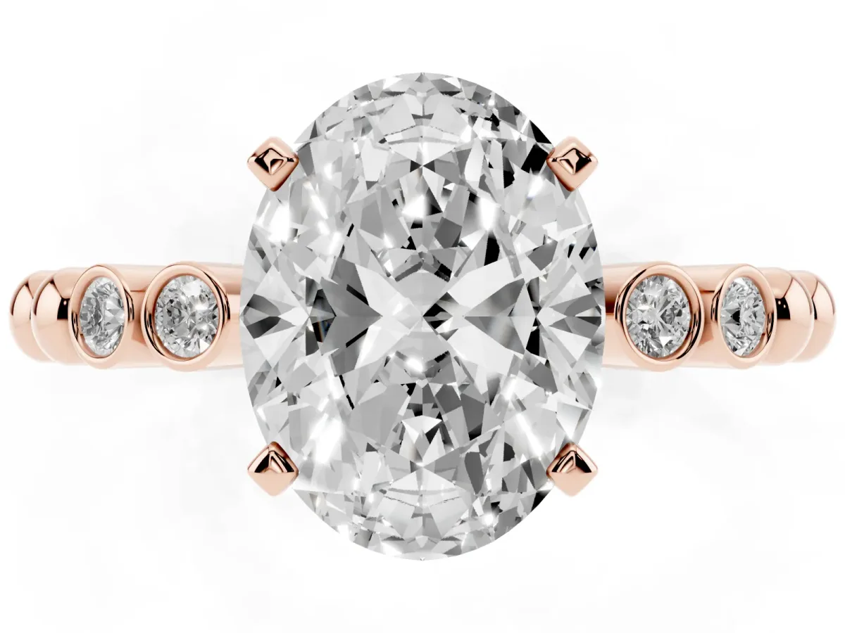 Oval Cut Solitaire Bezel Accent Diamond Engagement Ring with Beaded Band and Four-Prong Setting Rose gold